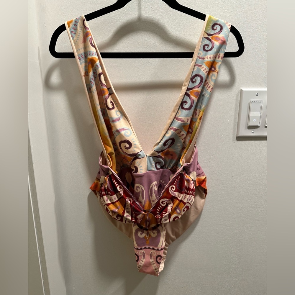 Agua Bendita One piece swimsuit size L. Adjustable straps and belted at waist